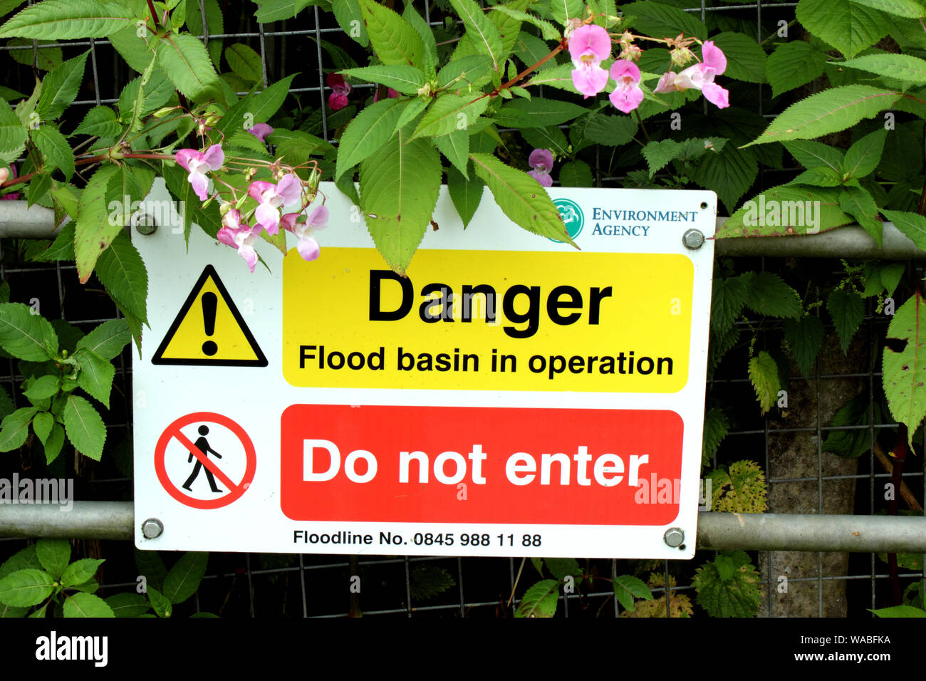 Sign warning of flood risk Stock Photo