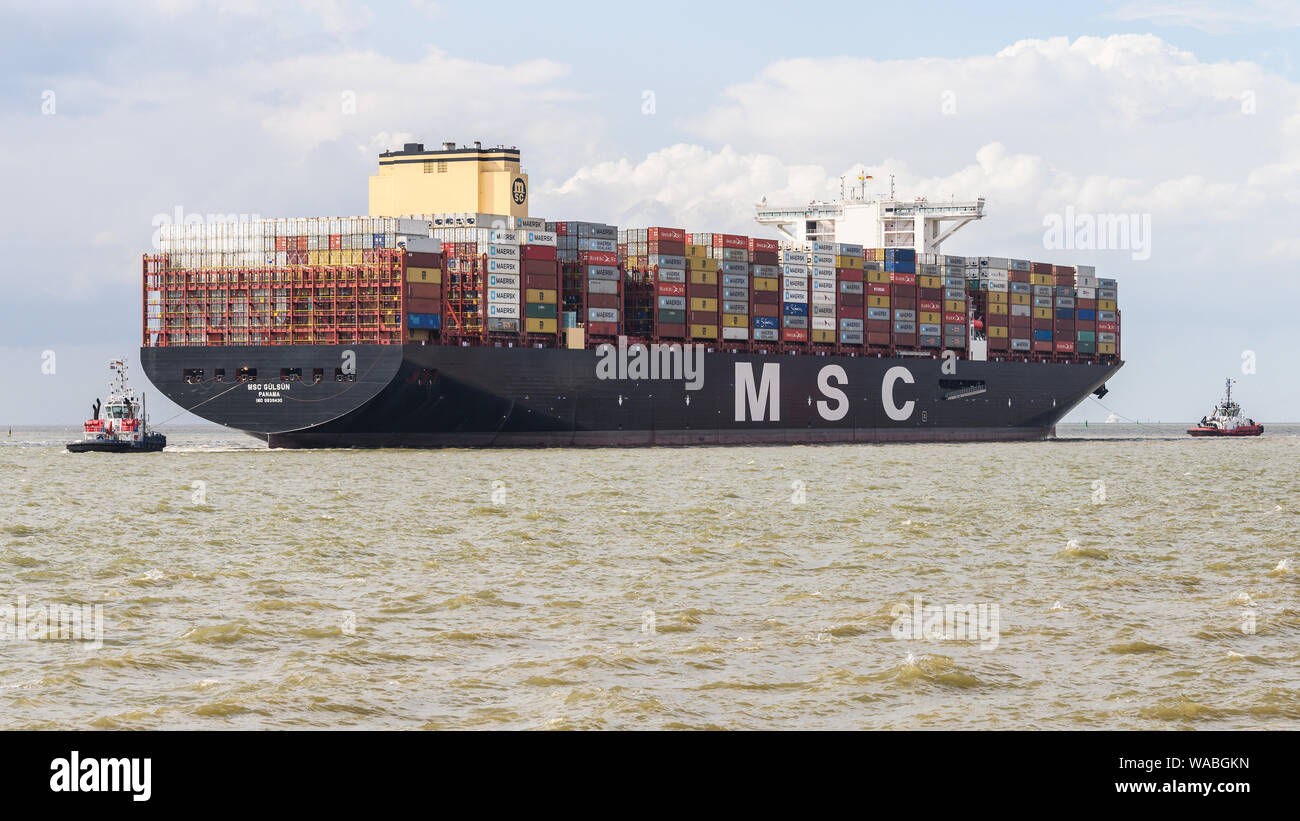 Bremerhaven, Germany. 19th Aug, 2019. The currently largest container ship in the world 'MSC Gülsün' is calling at the Bremerhaven container terminal for the first time. According to the Swiss shipping company Mediterranean Shipping Company (MSC), 'MSC Gülsün' can carry 23 756 standard containers (TEU), including 2000 refrigerated containers. Credit: Mohssen Assanimoghaddam/dpa/Alamy Live News Stock Photo