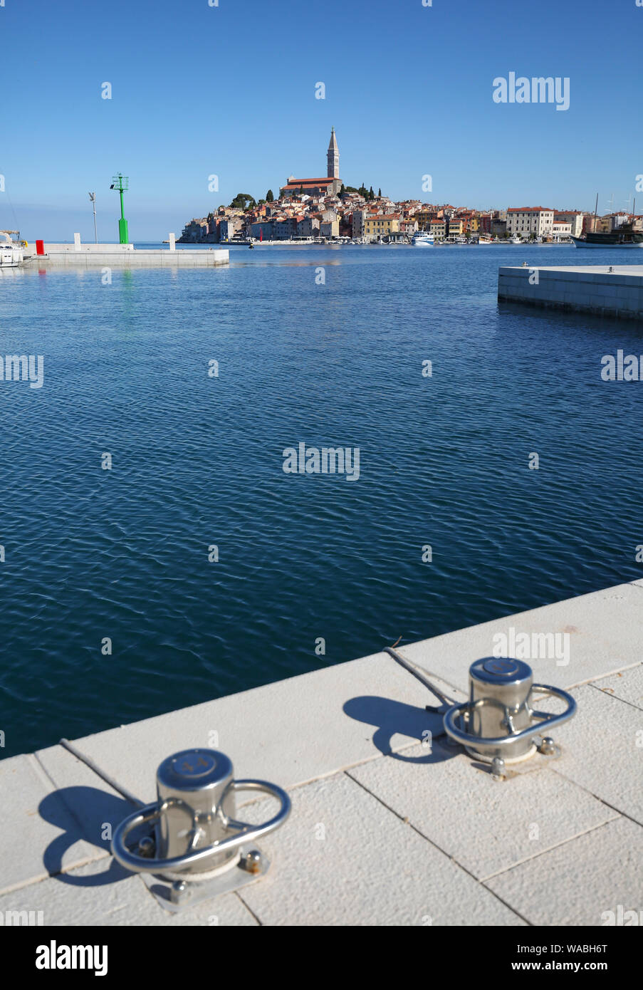 South end seaside promenadem in the five star ACI marina with city of Rovinj in the background, Istria, Croatia. Stock Photo