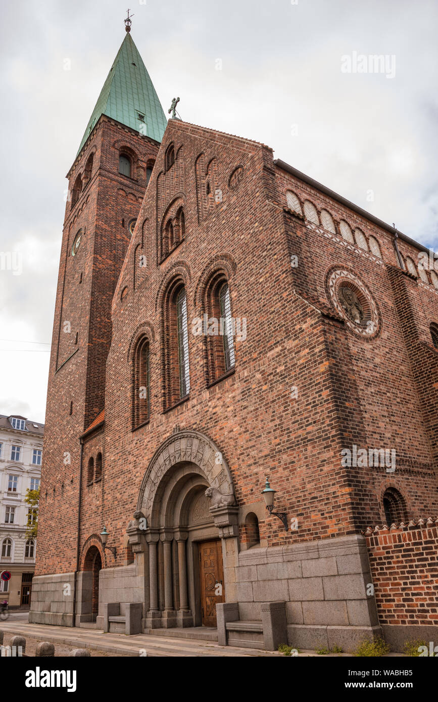 the tower and entrance gate to St. Andrew's church in Copenhagen, August 16, 2019 Stock Photo