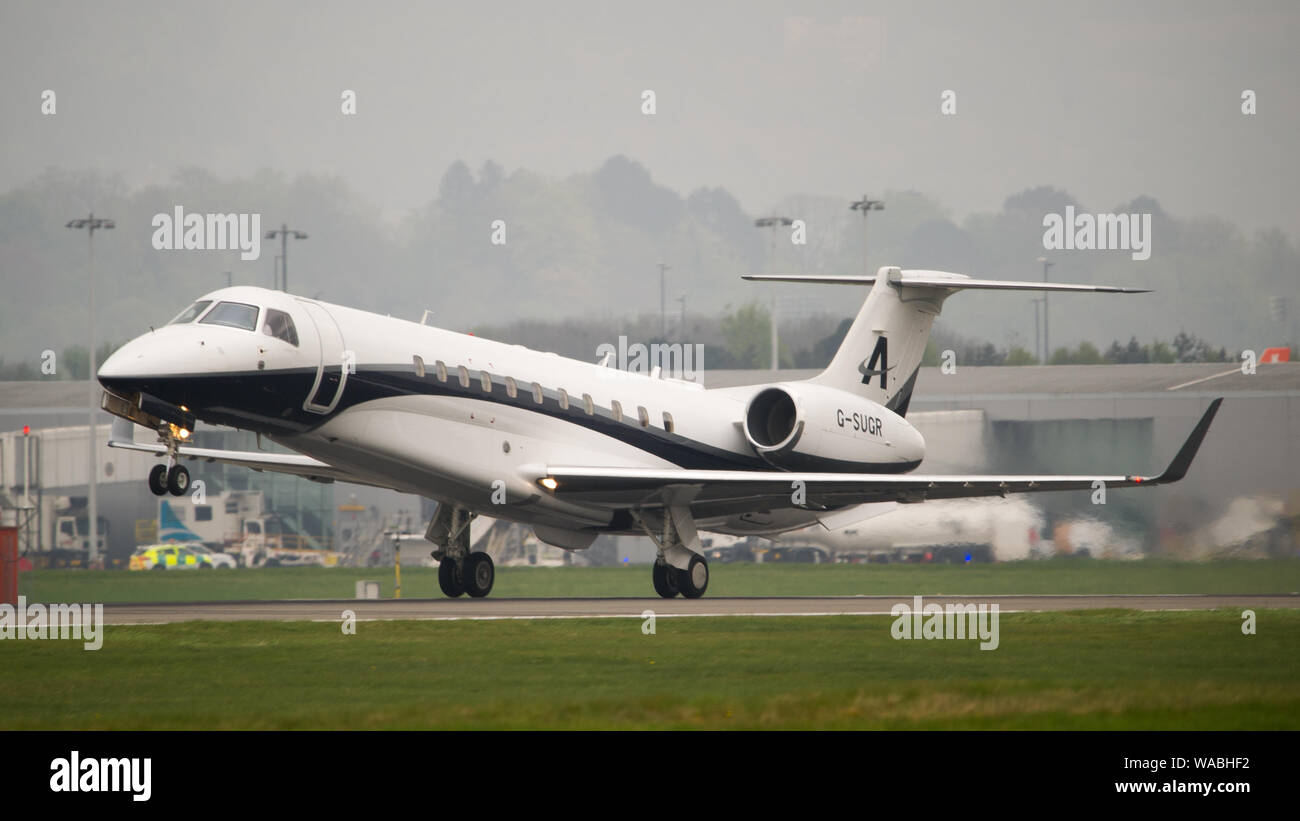 Glasgow, UK. 24 April 2019. Lord Alan Sugar's brand new aircraft, appropriately registered G-SUGR Embraer Legacy 650, executive transport private bixjet seen taking off at Glasgow International Airport. Colin Fisher/CDFIMAGES.COM Credit: Colin Fisher/Alamy Live News Stock Photo