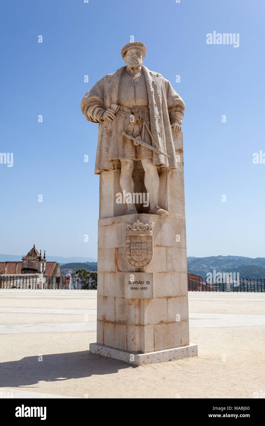 The statue of King Joao III in the courtyard square of the Old University (Patio das Escoles) of Coimbra, Beira Litoral, Portugal Stock Photo