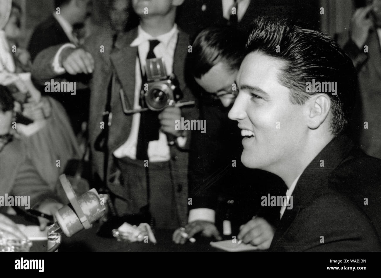 Elvis Presley at a press conference in Paris, France (circa 1958) File  Reference # 33848-389THA Stock Photo - Alamy