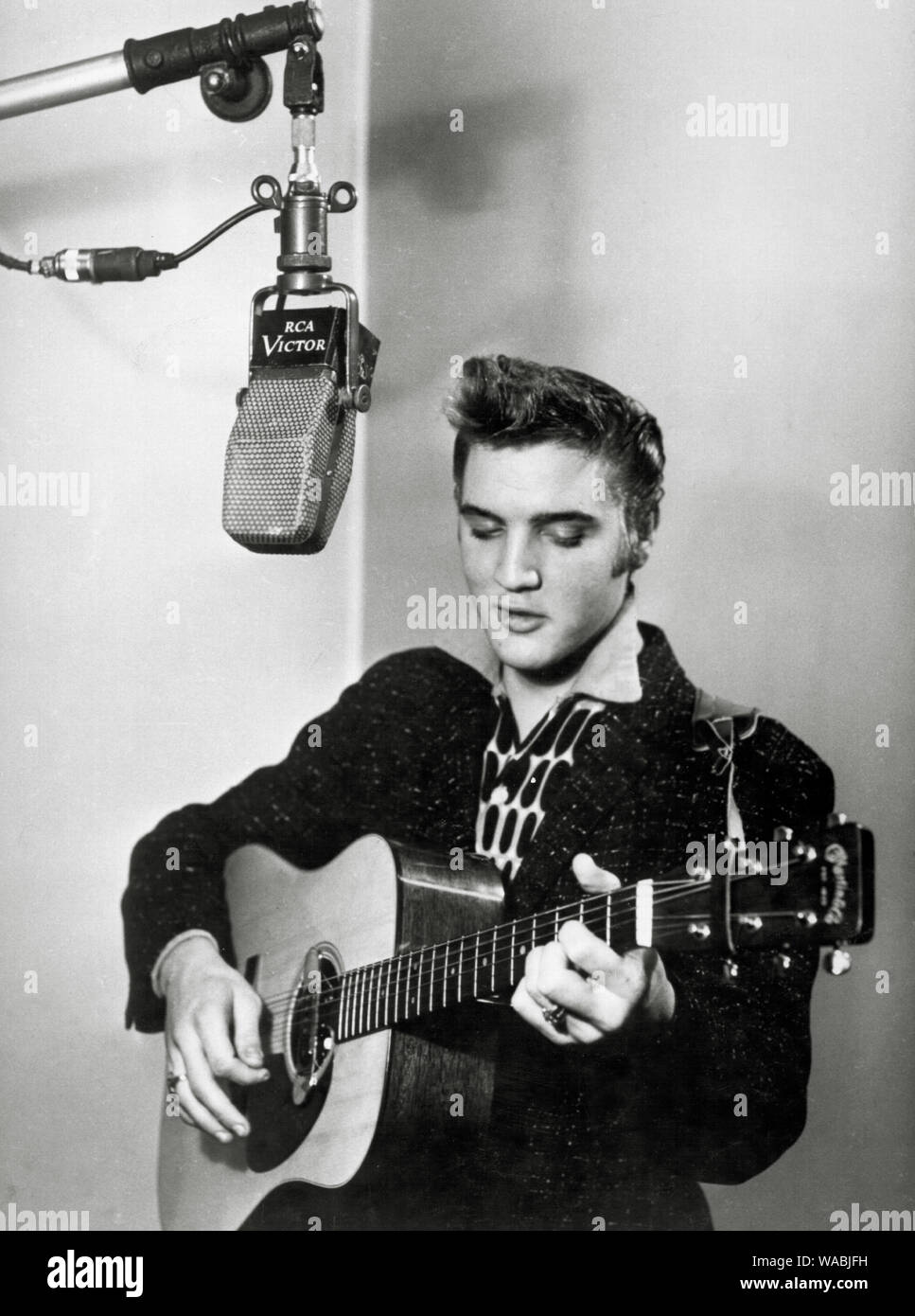 Elvis Presley in RCA Victor's New York studios in November 1955, posing for his first official publicity shots for his new record company  File Reference # 33848-093THA Stock Photo