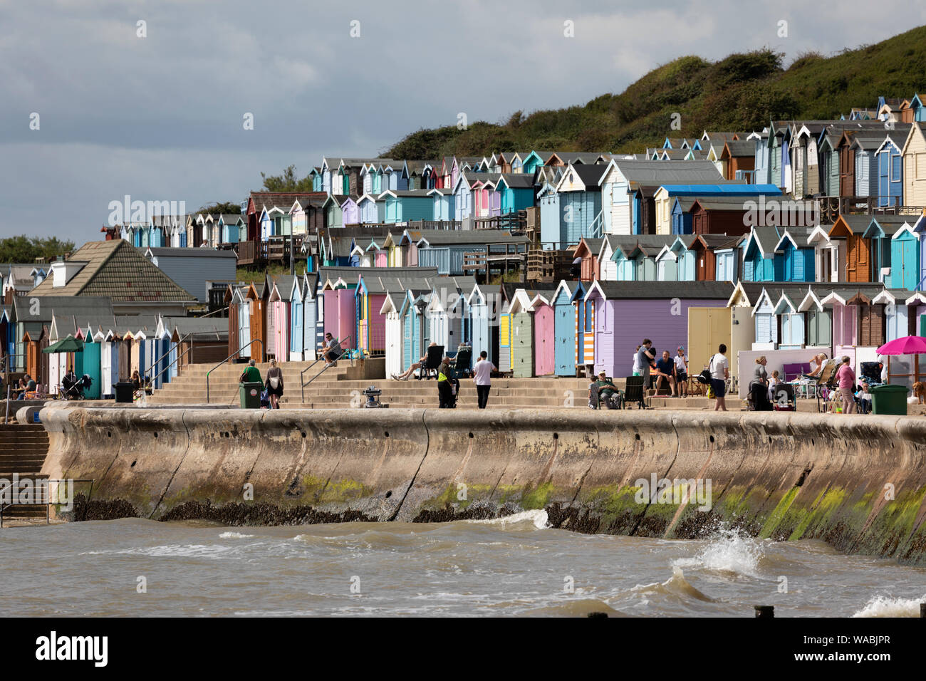 Colourful beach huts along the seafront, Walton-on-the-Naze, Essex, England, United Kingdom, Europe Stock Photo