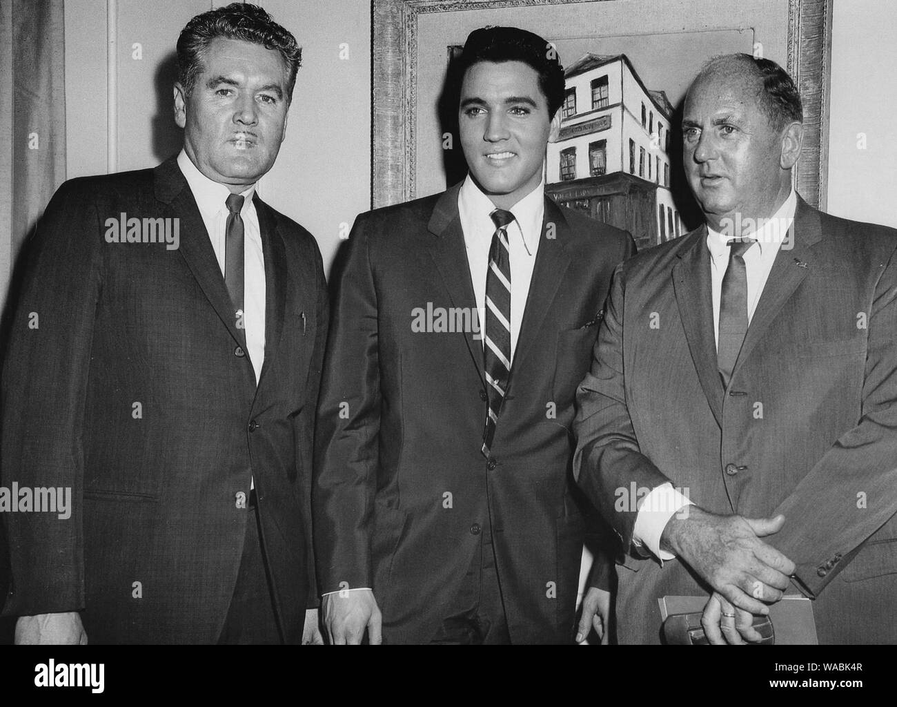 Elvis Presley with his father, Vernon Presley and manager,  Colonel Tom Parker, circa (1962)  File Reference # 33848-265THA Stock Photo
