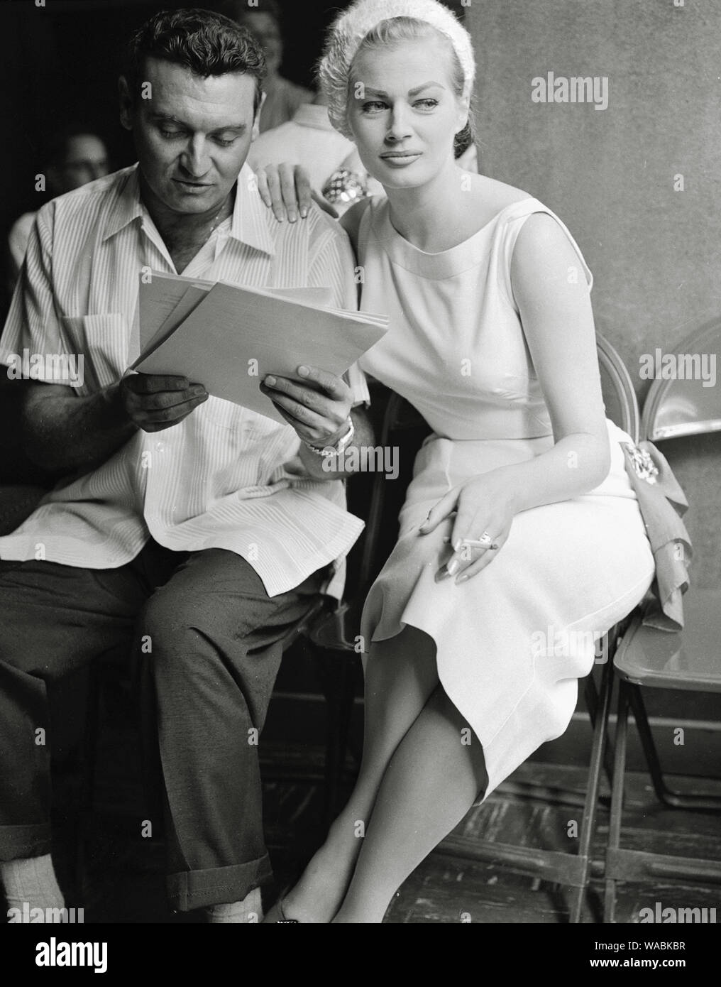 Frankie Laine and Anita Ekberg during rehearsal for an episode of his variety television series 'Frankie Laine Time' (1956) CBS  File Reference # 33848-117THA Stock Photo