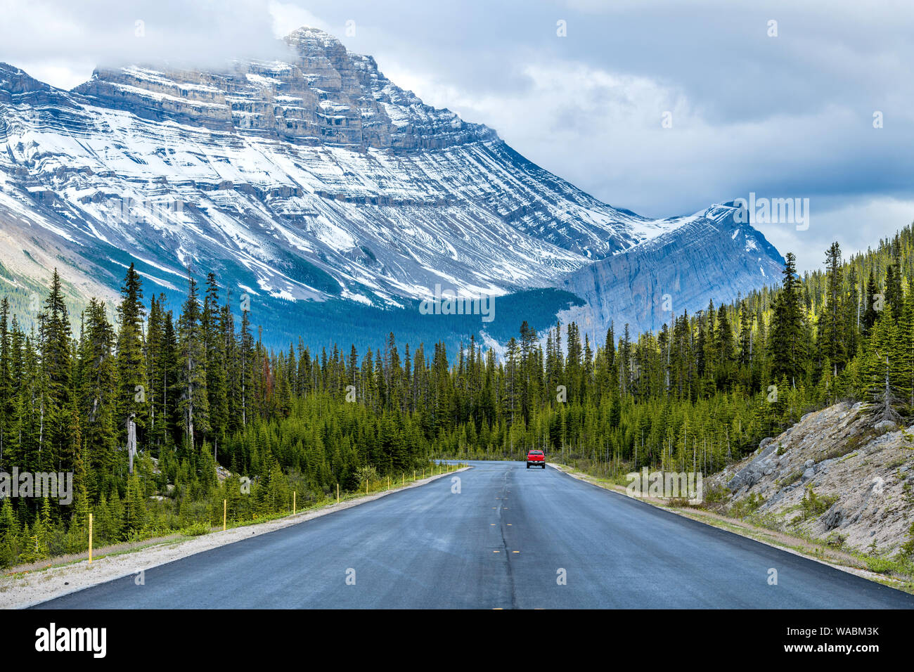 Icefields Parkway at Cirrus Mountain - A Spring evening view of Icefields Parkway at base of Cirrus Mountain, Banff National Park, Alberta, Canada. Stock Photo