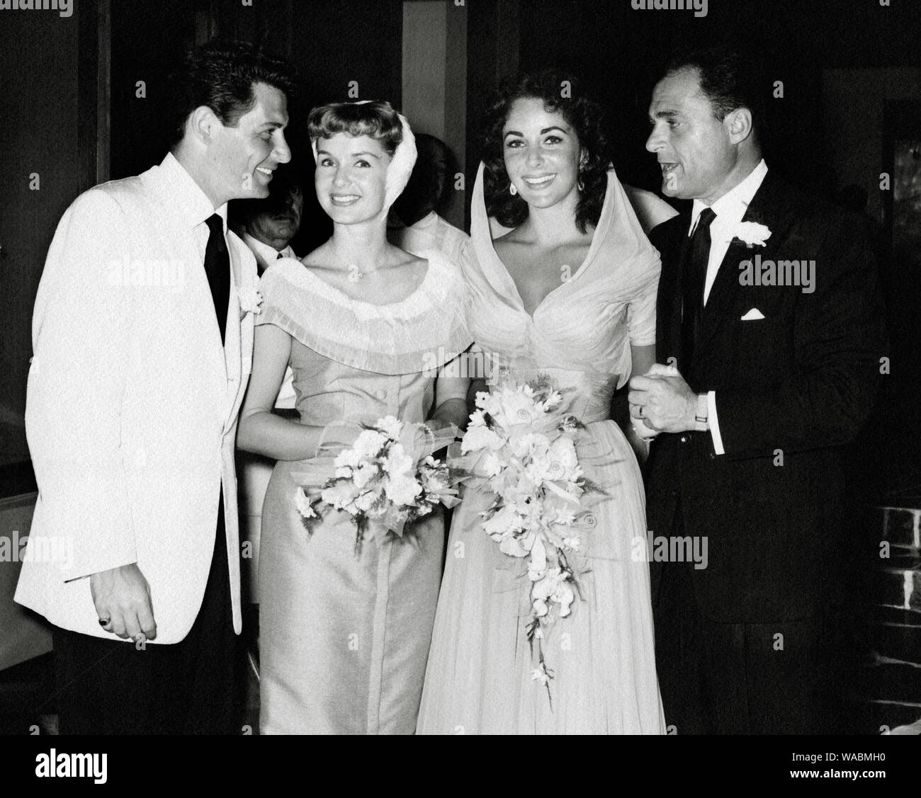 Eddie Fisher and Debbie Reynolds at the wedding of Elizabeth Taylor and Michael Todd (1957)  File Reference # 33848-299THA Stock Photo