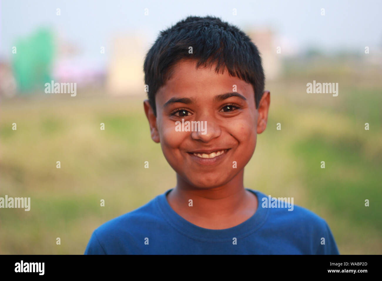 One Indian country boy with innocent smile Stock Photo