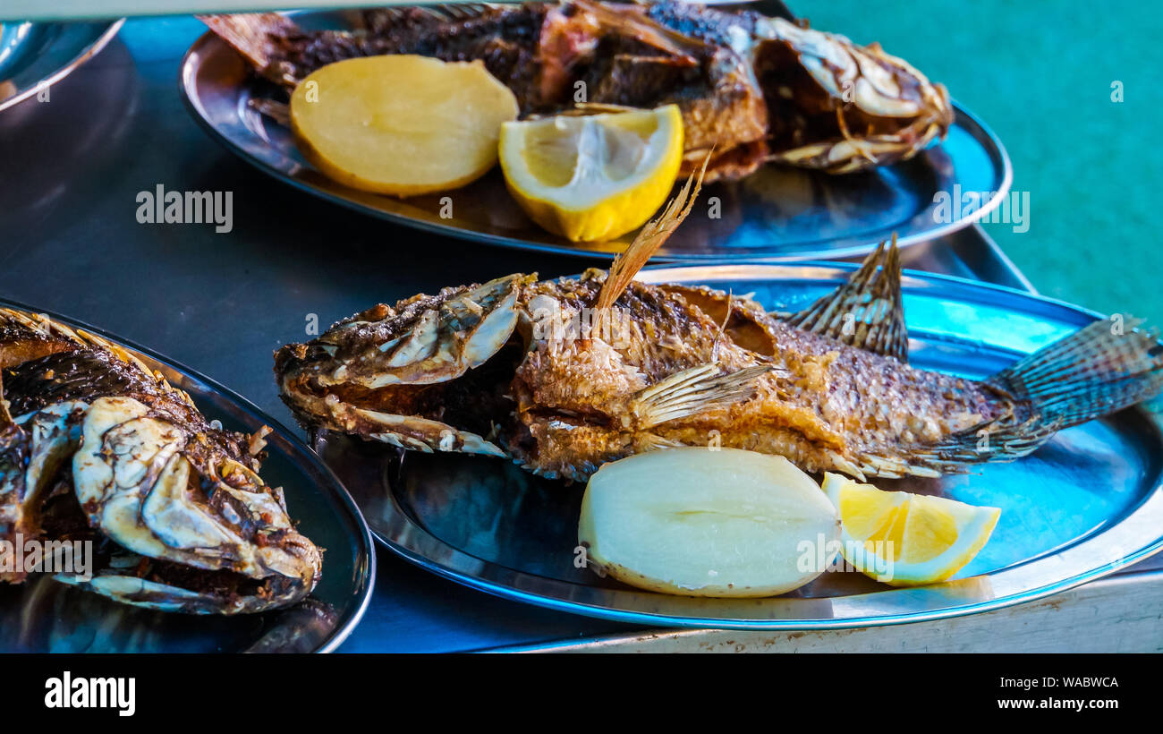 Israel, Delicious fresh tilapia fish or also known st peters fish meal out of the sea of galilee Stock Photo