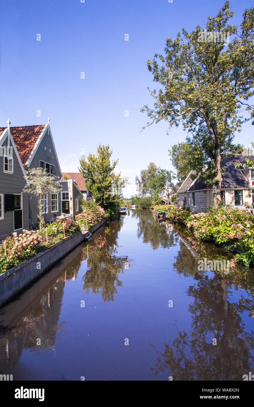 Scenic canal in the village of Broek in Waterland, North Holland, Netherlands Stock Photo