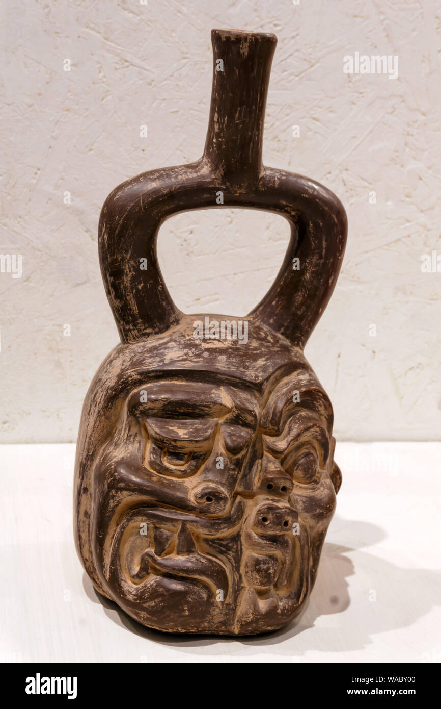Yekaterinburg, Russia - January 17, 2019: ancient Peruvian ceramic vessel depicting the dualism between man and jaguar, Cupisnique culture, 1200-200 B Stock Photo