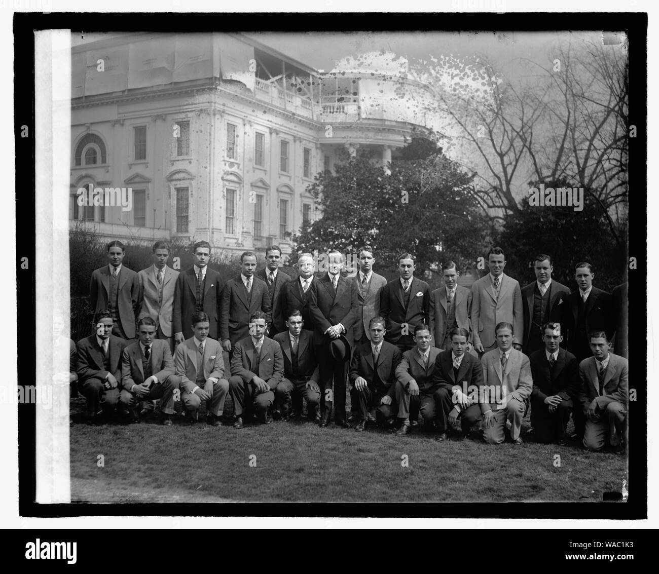 Coolidge and unidentified group on White House lawn Stock Photo Alamy