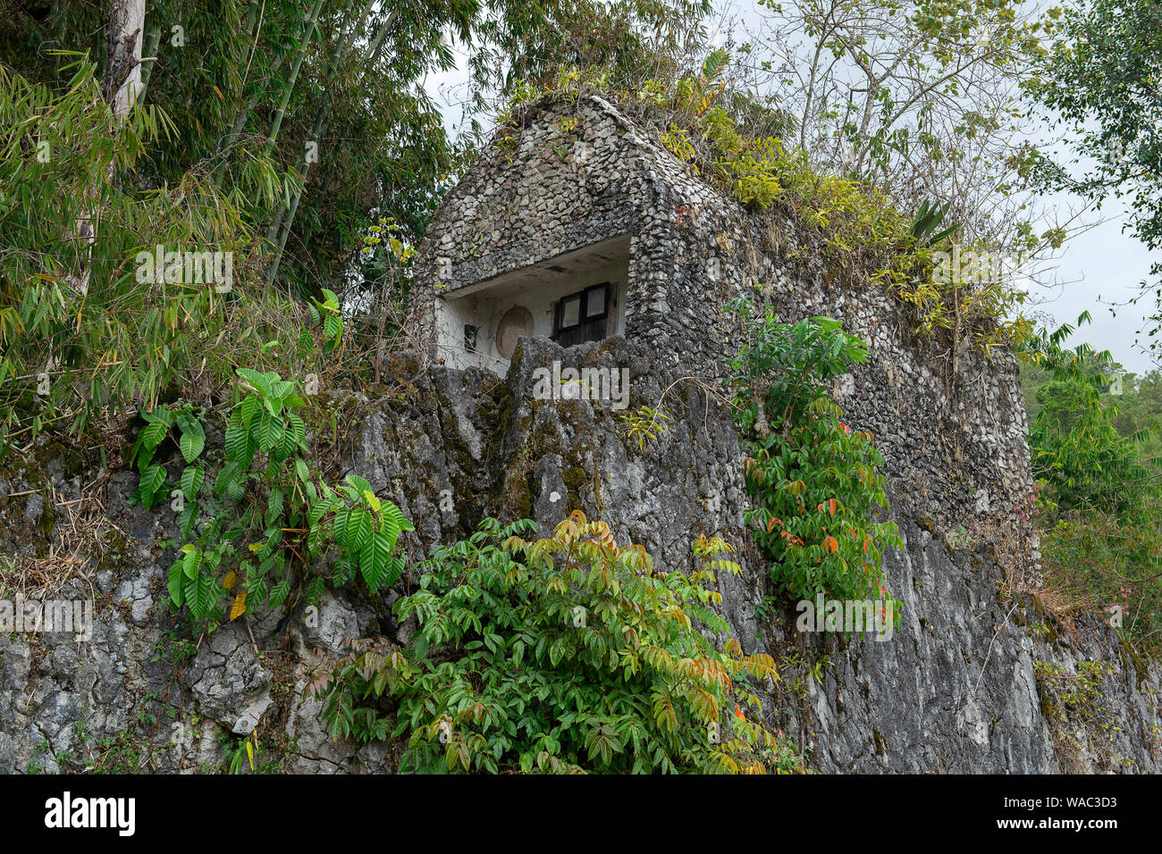 Cliffs burial site, traditional burial ground in Tana Toraja, worldwide unique ancestor cult of Sulawesi, Indonesia Stock Photo