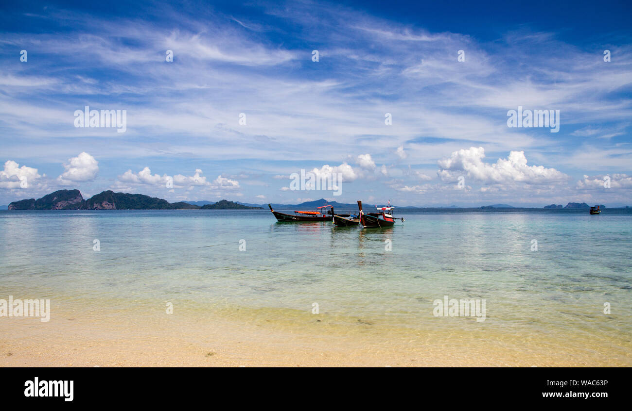 Beautiful beach view with boats at Koh Kradan, Thailand (sea, mountains