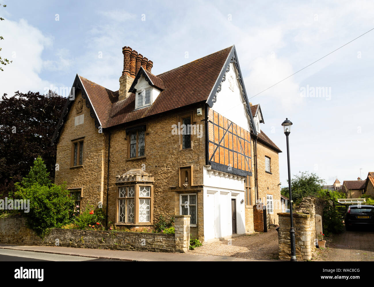 Large house built from local stone and brick, Turvey, Bedfordshire Stock Photo