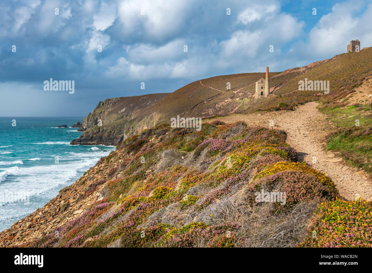Wheal Coates, near St. Agnes in North Cornwall, England. Monday 19th August 2019. UK Weather. Sunshine and heavy showers don't deter visitors to 'Poldark Country' and the spectacular views at Wheal Coates near St. Agnes Beacon in North Cornwall. Credit: Terry Mathews/Alamy Live News Stock Photo