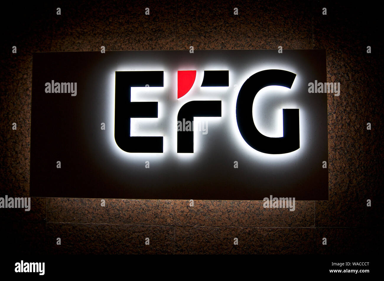 Lugano, Ticino, Switzerland - 25th July 2019 : Illuminated EFG Bank sign. EFG Bank is a private Swiss bank specialized in private investments and asse Stock Photo