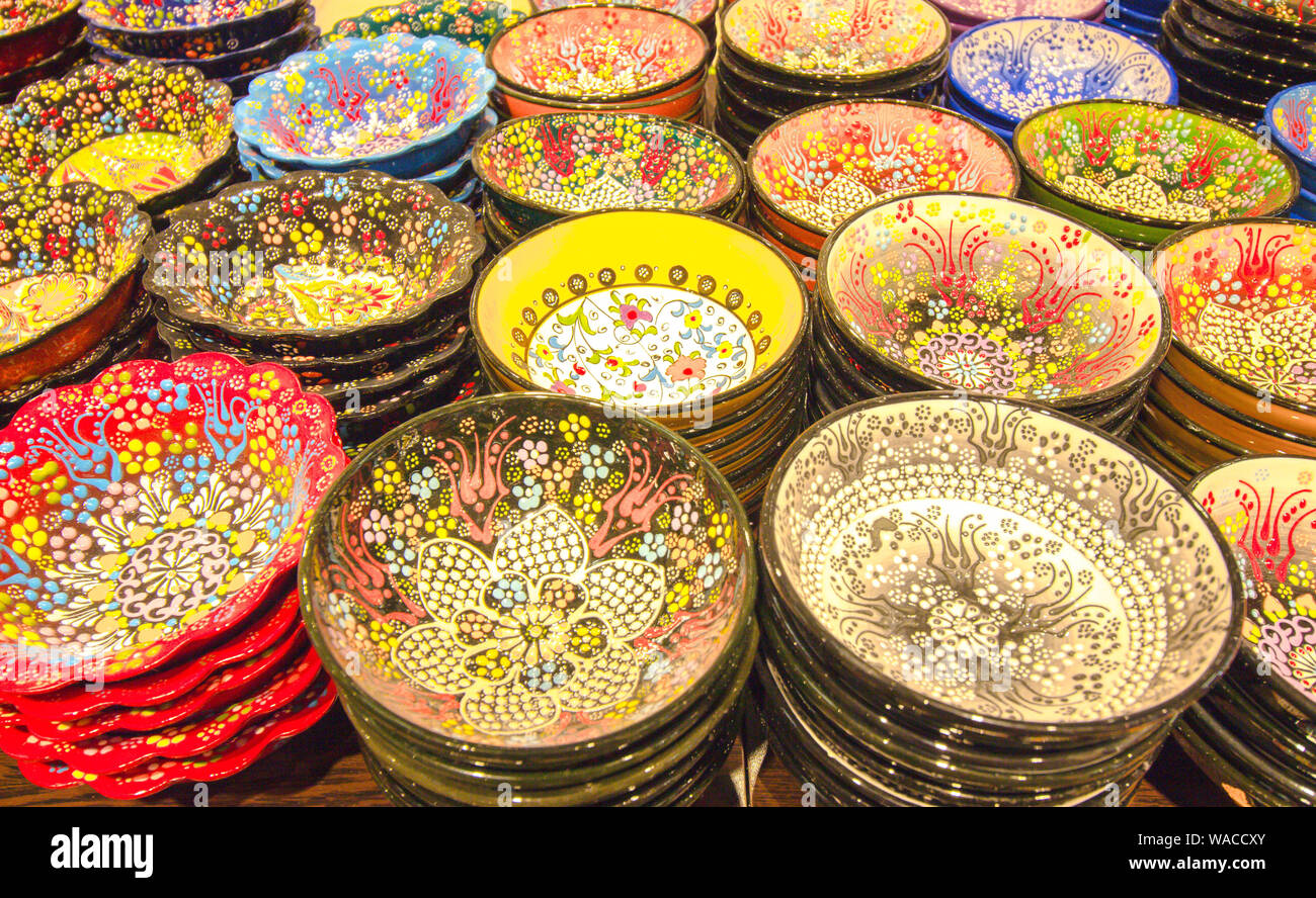 Ceramic plates of various colors. Plates stand on top of each other and