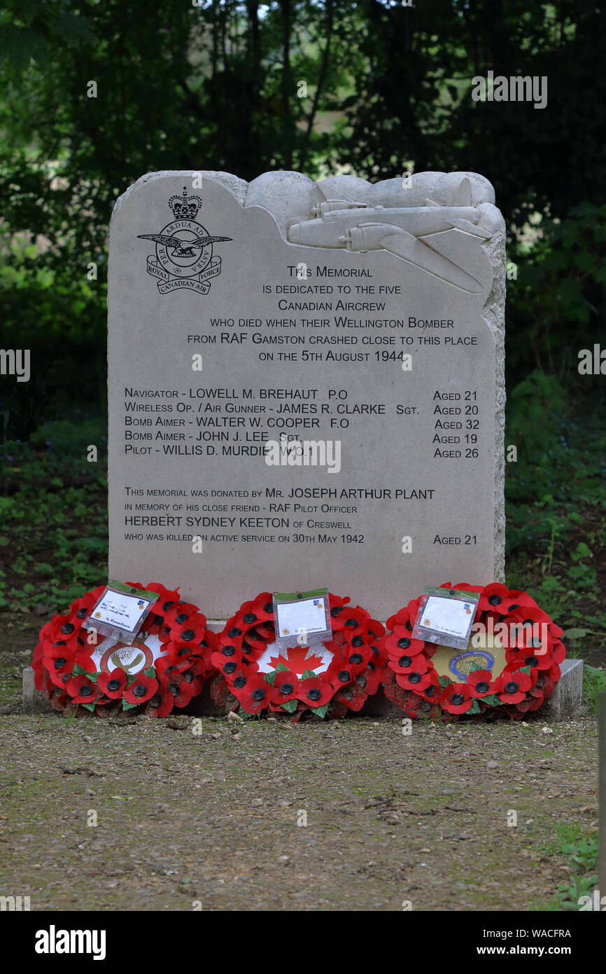 A memorial stone erected at Cresswell Crags to remember the 5 Canadian air crew that lost their lives in a plane crash during the second world war.RIP Stock Photo