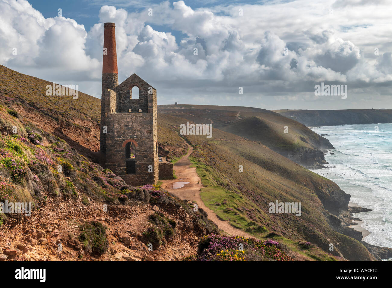 Wheal Coates, near St. Agnes in North Cornwall, England. Monday 19th August 2019. UK Weather. Sunshine and heavy showers don't deter visitors to 'Poldark Country' and the spectacular views at Wheal Coates near St. Agnes Beacon in North Cornwall. Credit: Terry Mathews/Alamy Live News Stock Photo