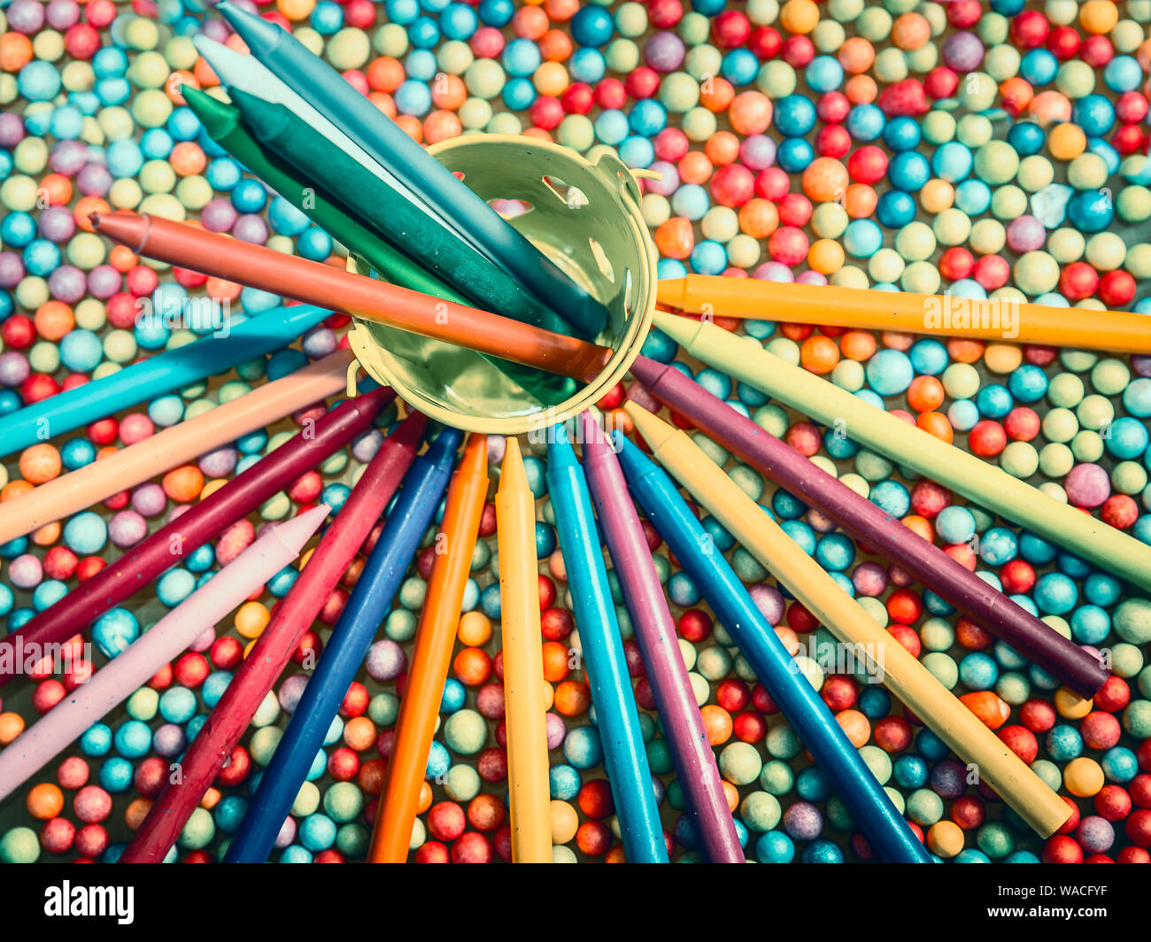 top view of multicolored pencils on balls background Stock Photo - Alamy