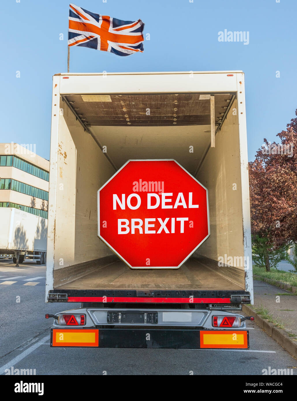 No Deal Brexit digital composite sign inside an empty container truck. UK is set to leave the EU by default on October 31st, 2019 Stock Photo