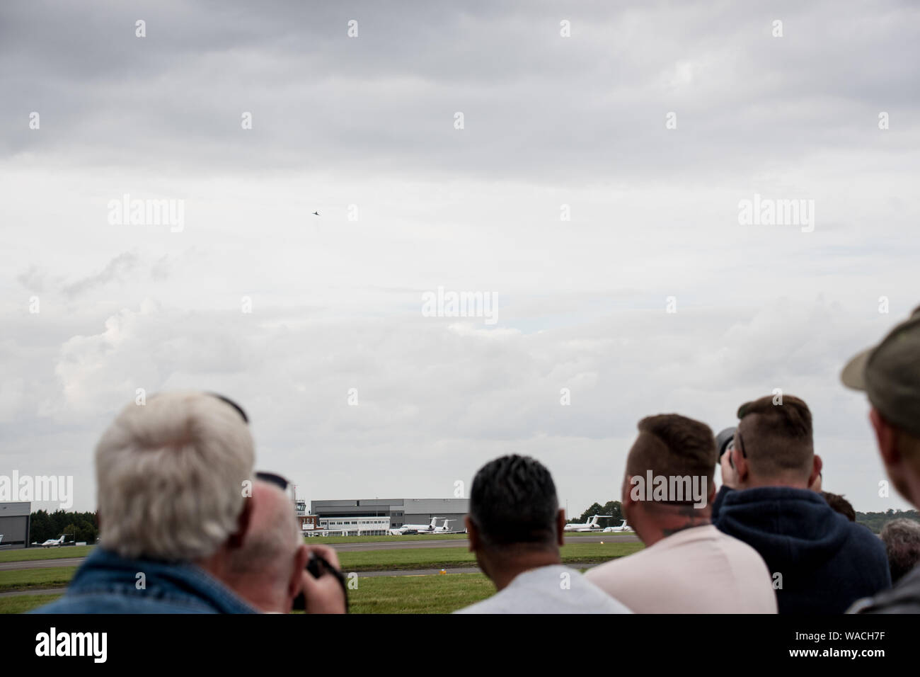 Spectators at a flying display watching and taking pictures (EDITORIAL USE ONLY) Stock Photo