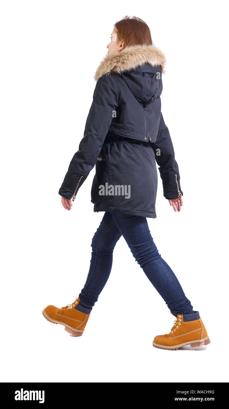 Back view of going woman in jeans and winter jacket. walking young girl . Rear  view people collection. backside view of person. Isolated over white ba  Stock Photo - Alamy