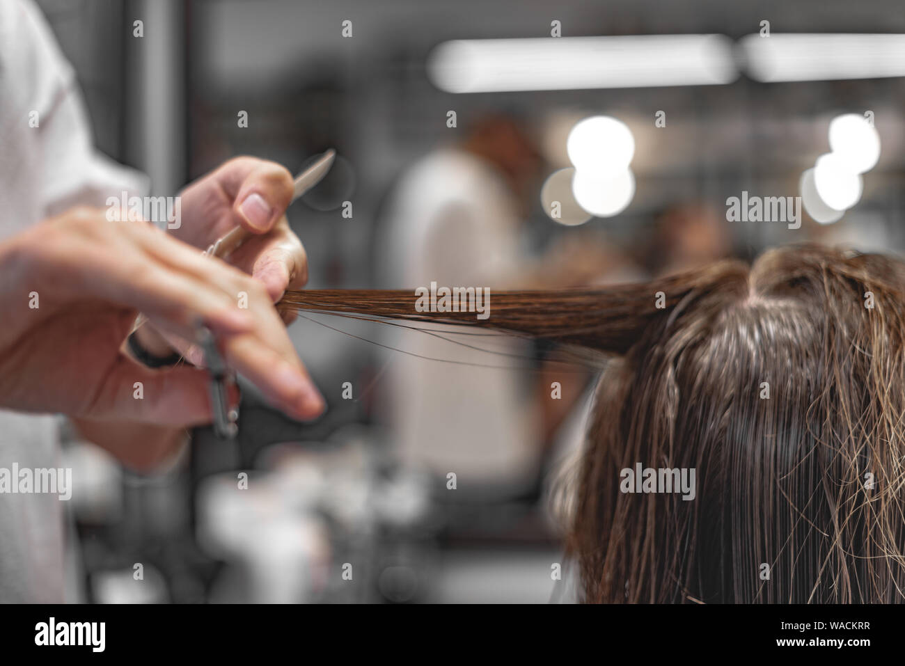 Men's beauty salon. The man makes a haircut Stock Photo - Alamy