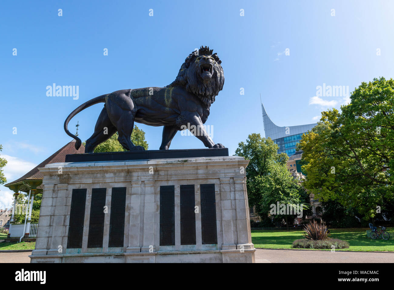 Reading scenes with the prominent  The Maiwand Lion, sculpture war memorial in Forbury Gardens and the striking new landmark  tower building The Blade Stock Photo