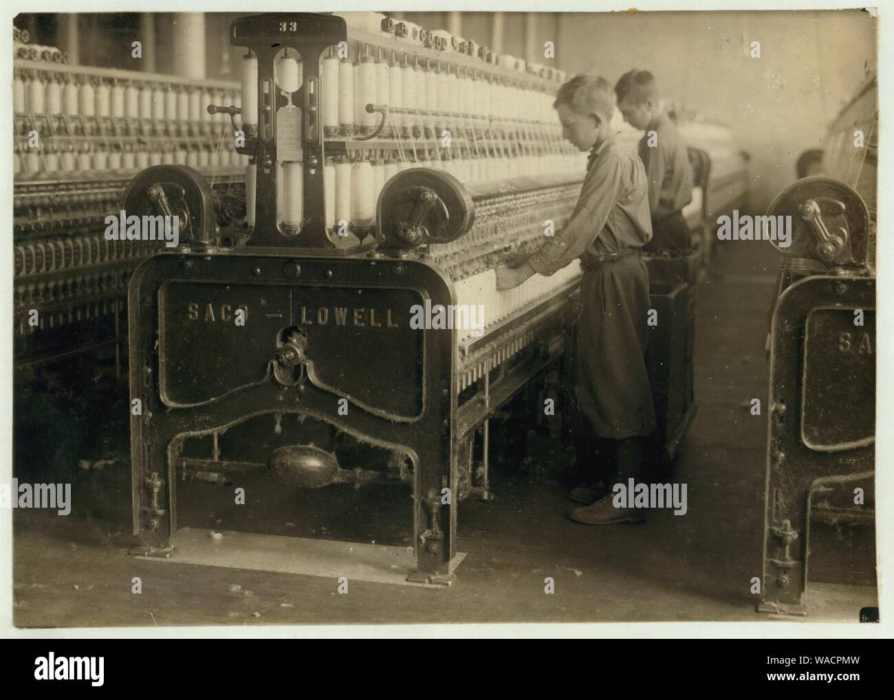 Doffers - Boss said 14 and 15 years old. Indian Orchard Cotton Mill Stock Photo