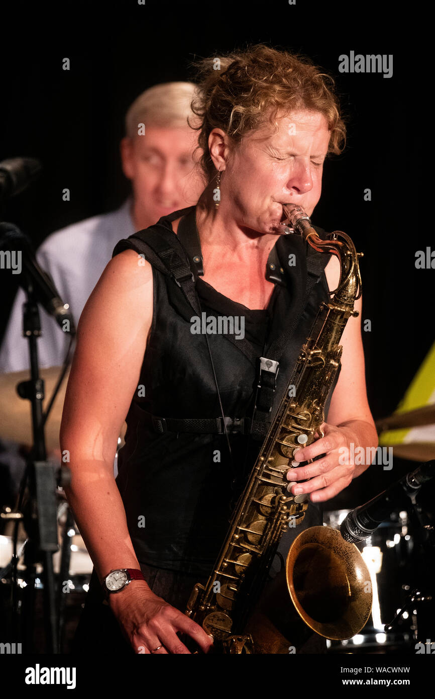 Female baritone sax player hires stock photography and images Alamy
