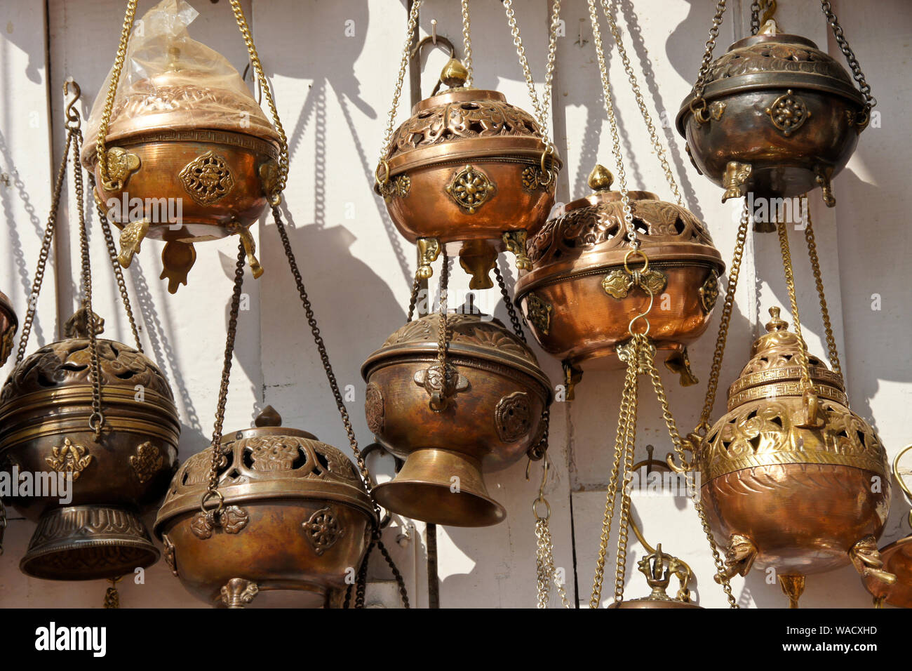 Tibetan Buddhist hanging incense burners for sale in shop at Boudhanath