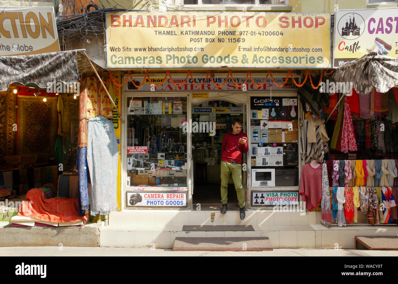 Carpet shop, photo shop, and clothing shop in Thamel district of Kathmandu, Nepal Stock Photo