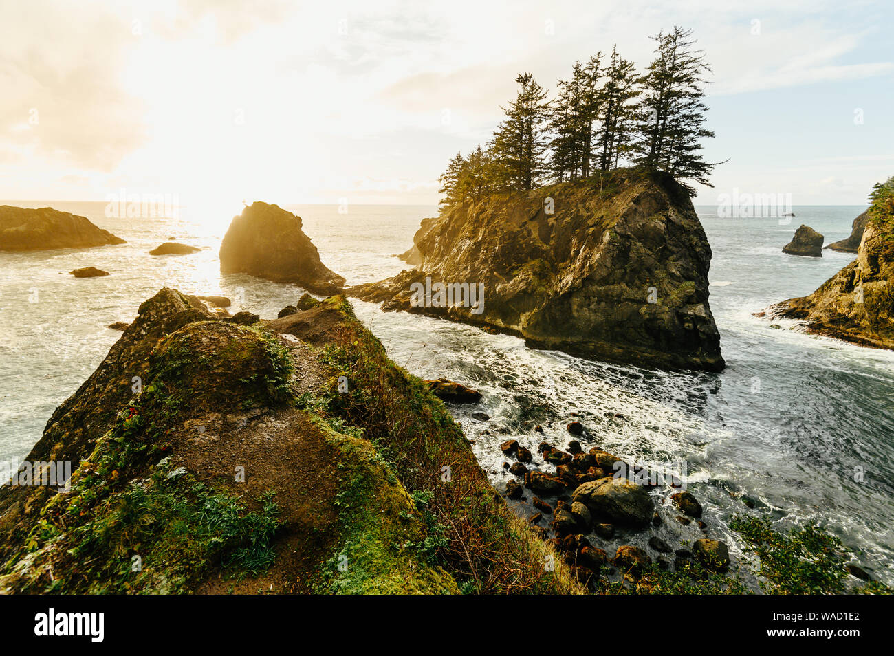 Haystack rocks at sunset along Oregon coast Stock Photo