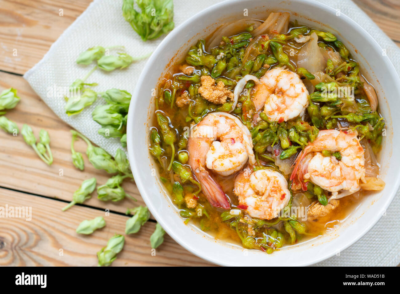 Sour soup with shrimp and cowslip creeper Stock Photo