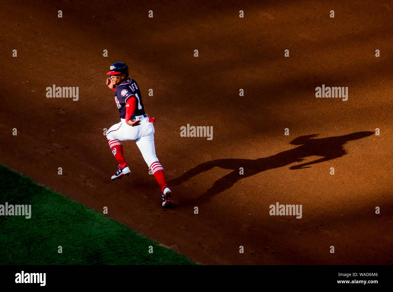 Running in the shadows Stock Photo Alamy