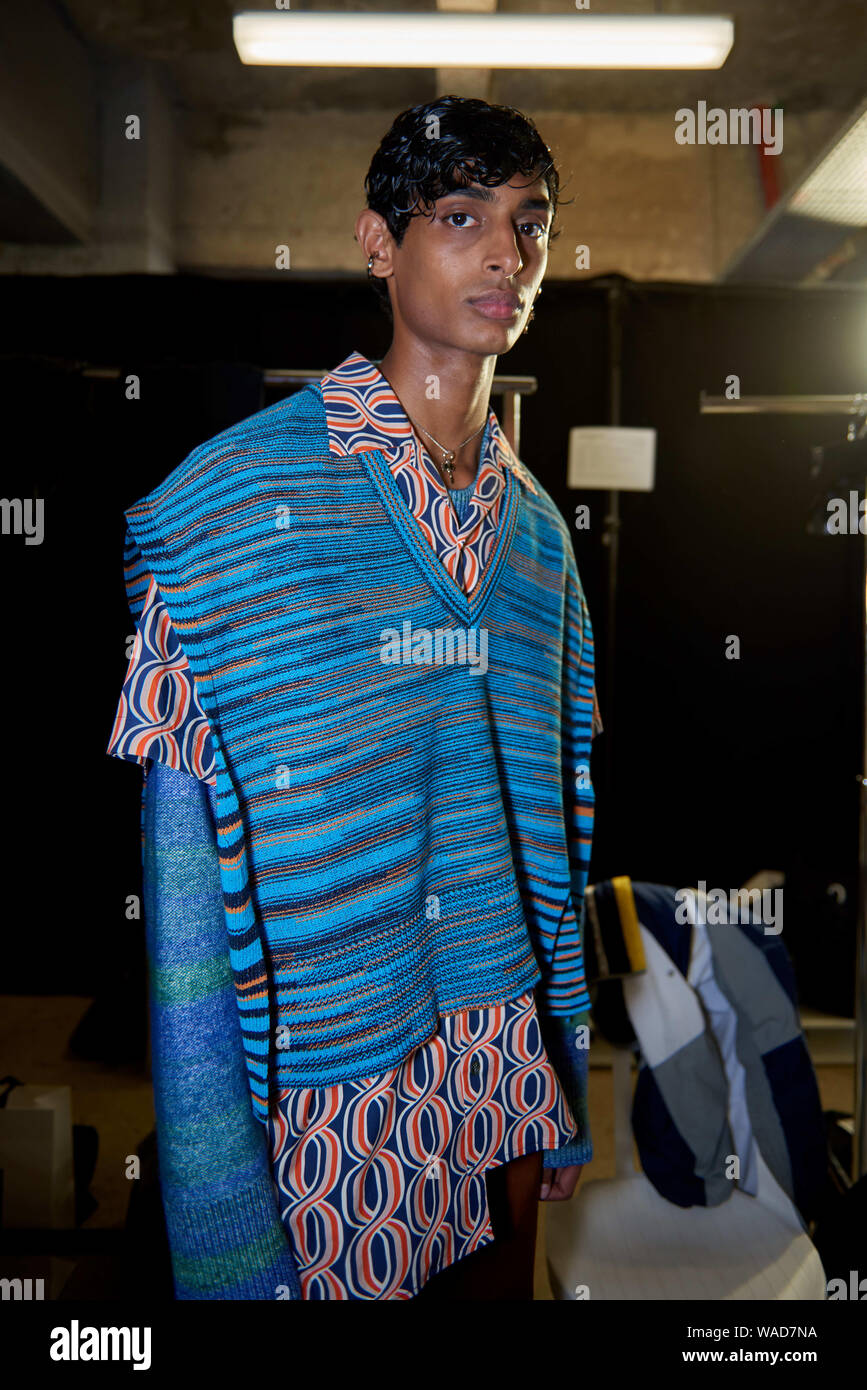 Models Are Pictured Backstage After Finishing Hair And Makeup At