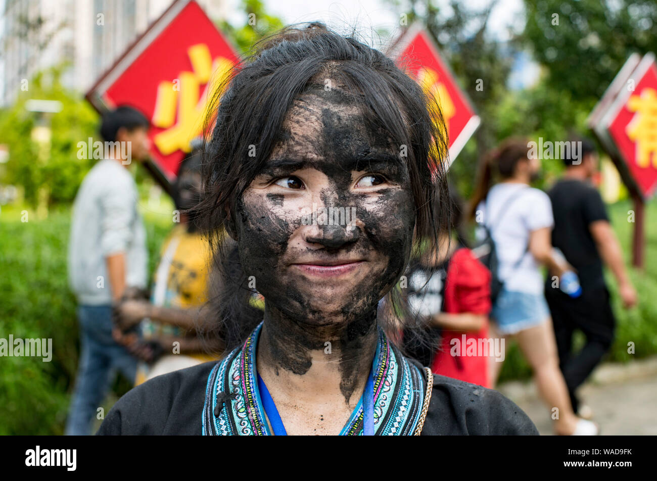 Chinese faces hi-res stock photography and images - Alamy