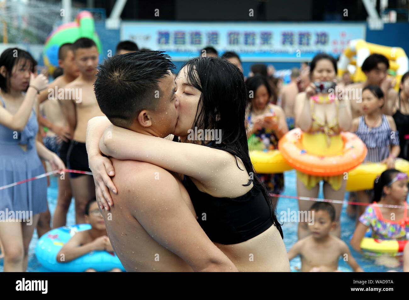 Lovers Kiss Each Other During A Kissing Competition In A Swimming Pool On The International Kissing Day Also Known As World Kissing Day In Chongqing Stock Photo Alamy