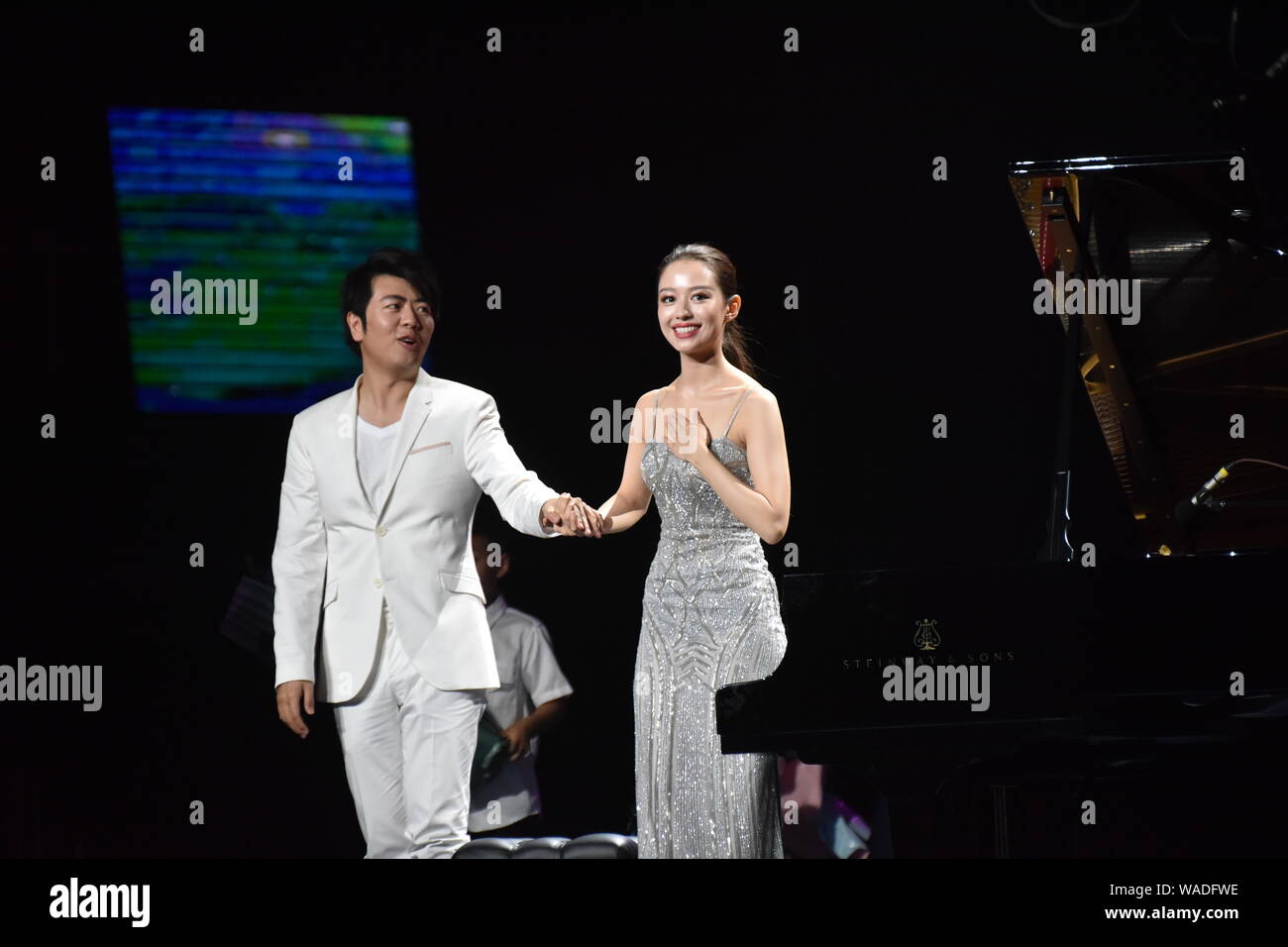 Chinese pianist Lang Lang and his wife Gina Alice Redlinger perform