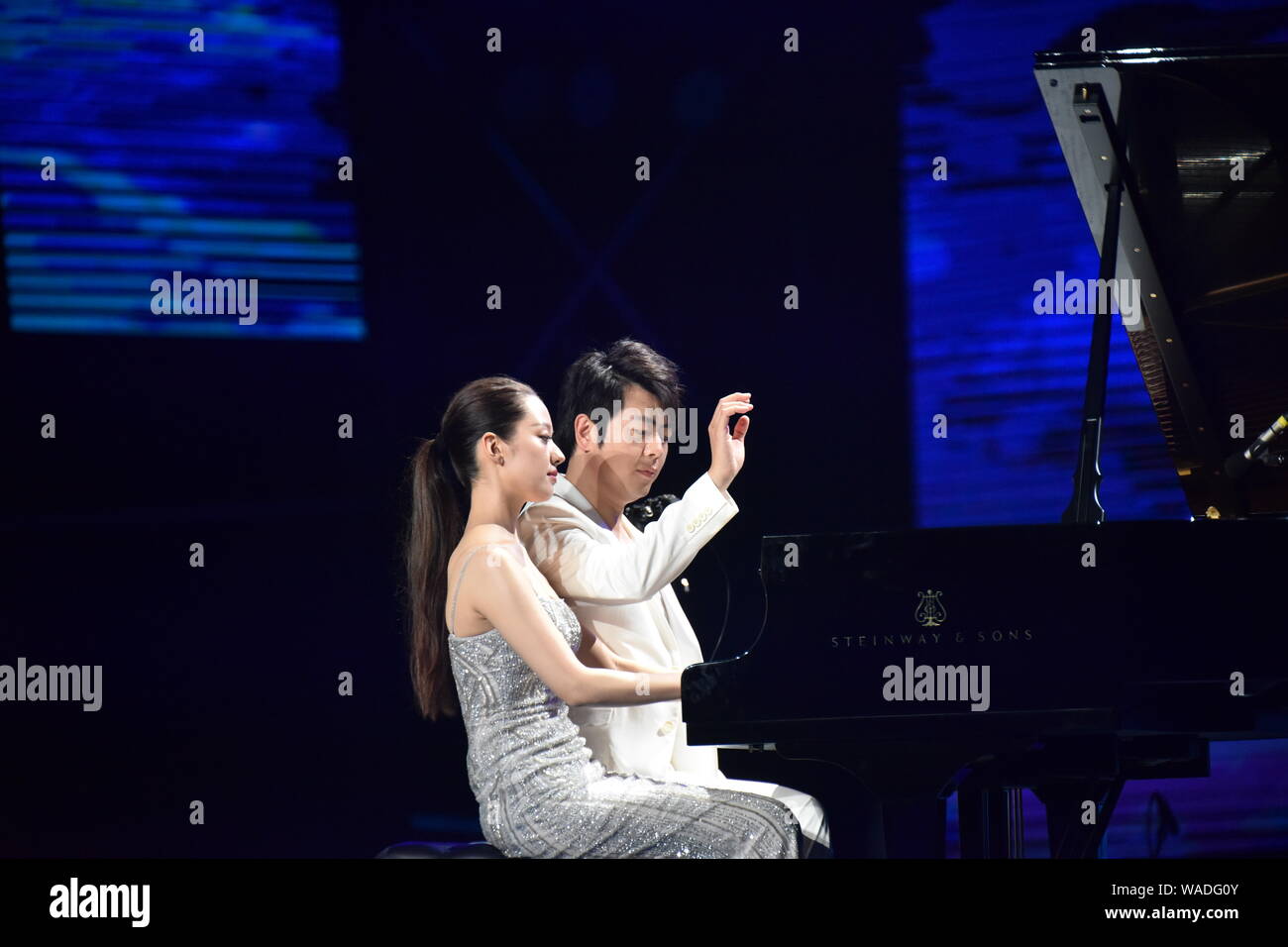 Chinese pianist Lang Lang and his wife Gina Alice Redlinger perform