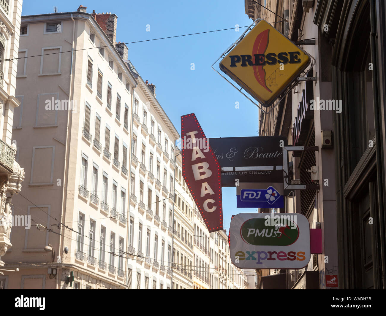 LYON, FRANCE - JULY 14, 2019: French tobacconist sign on a tobaccol seller, selling cigarettes. They are iconic of France, also called buraliste or ma Stock Photo