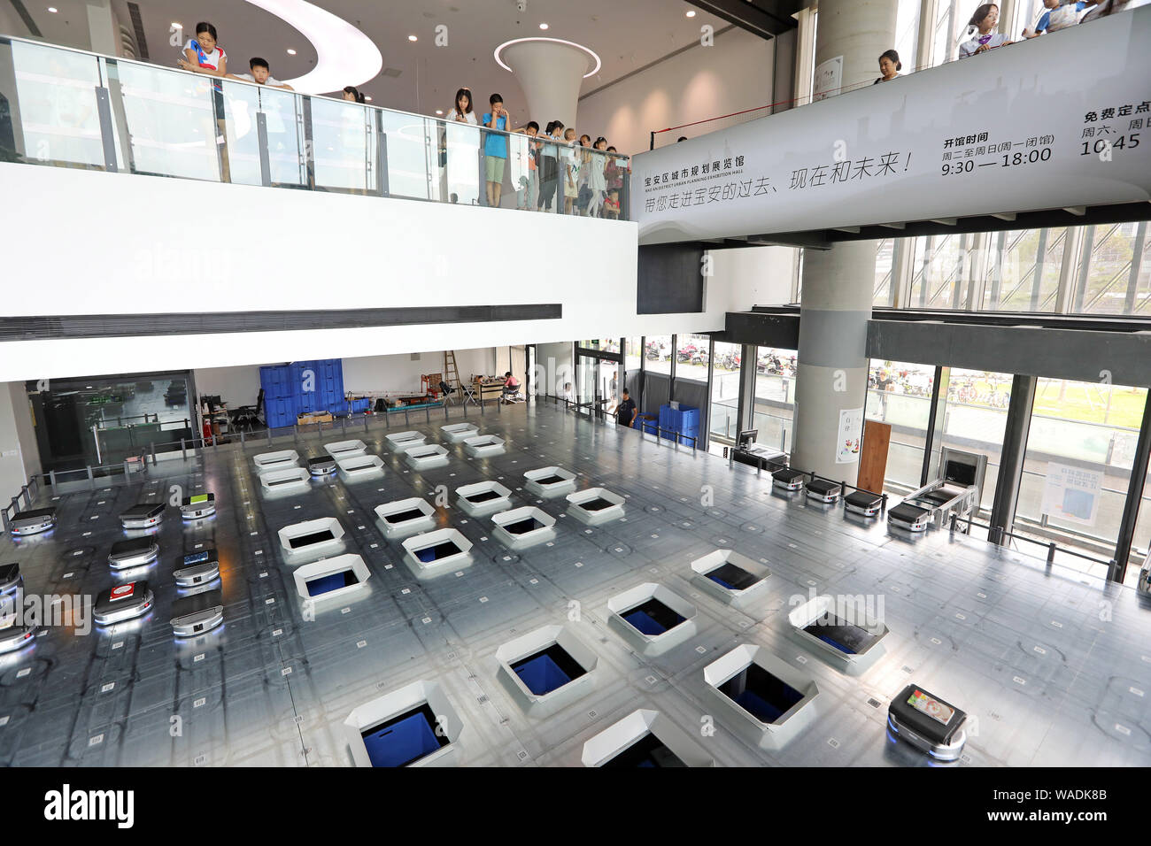 Robots work in Shenzhen Baoan Library to categorize and return book ...