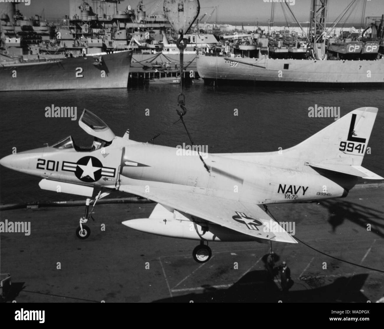 Douglas A4D-1 Skyhawk of VA-72 is loaded on USS Randolph (CVA-15) c1956. Stock Photo