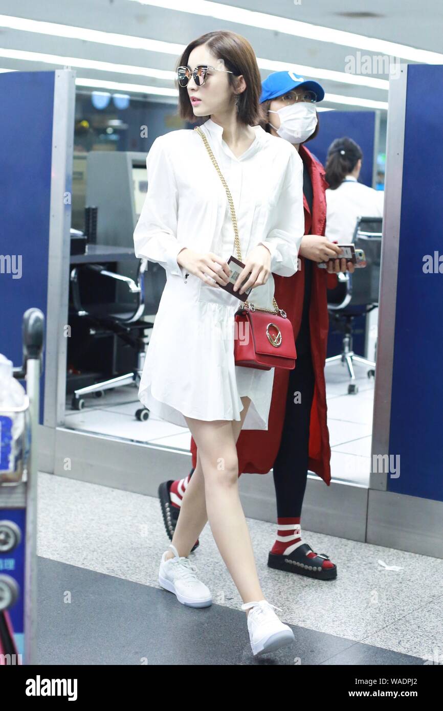 Chinese Uigur actress Gulnezer Bextiyar, also known as Gulnazar or Guli Nazha (Gulinazha), arrives at the Beijing Capital International Airport before Stock Photo