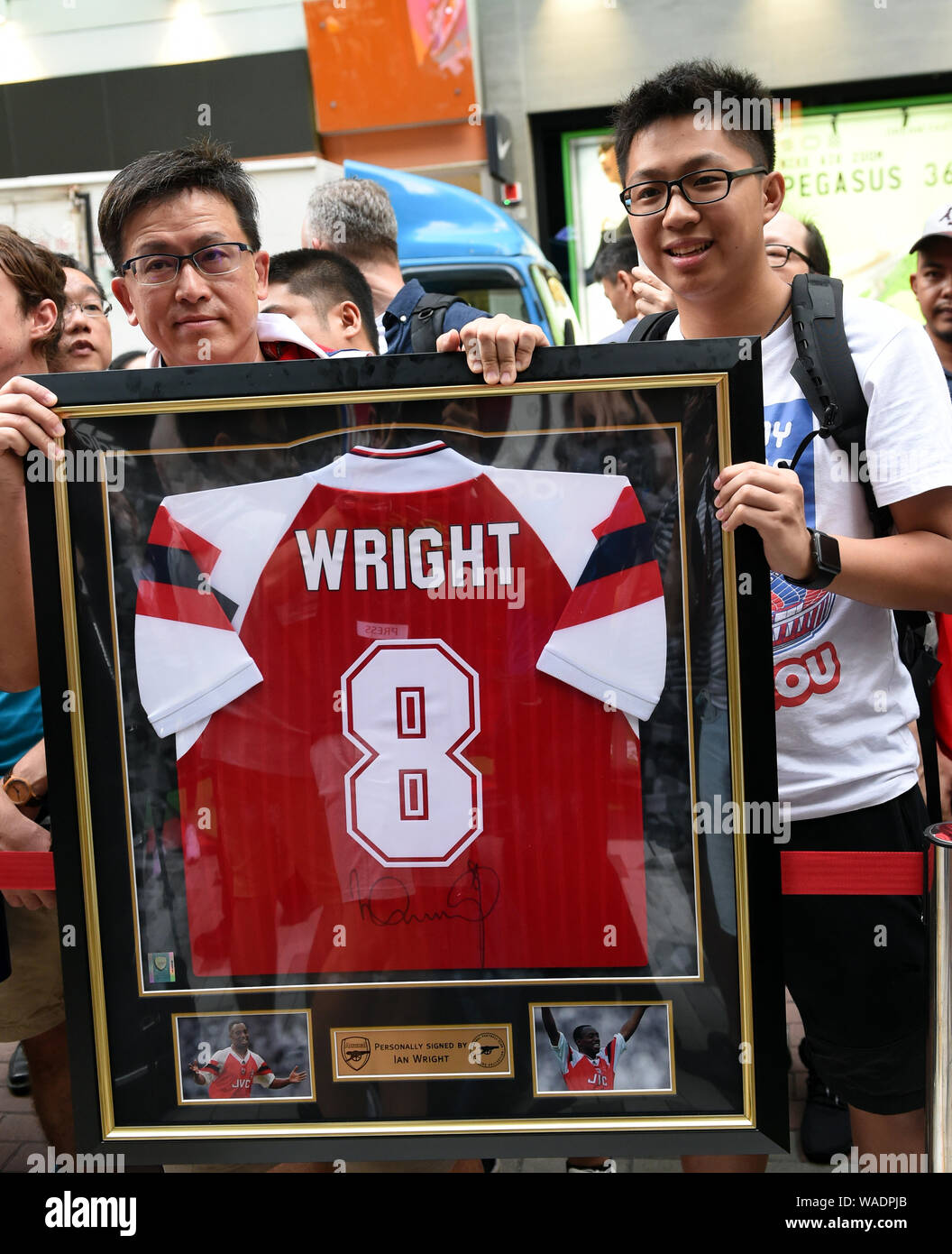 Fans show a team jersey of former English football player Ian Wright during  a promotional event for new team jersey of Arsenal F.C. of English footbal  Stock Photo - Alamy