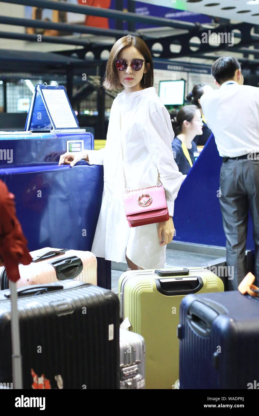 Chinese Uigur actress Gulnezer Bextiyar, also known as Gulnazar or Guli Nazha (Gulinazha), arrives at the Beijing Capital International Airport before Stock Photo